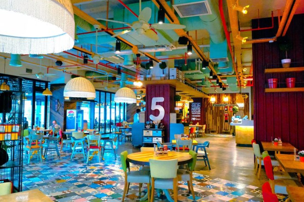 Modern interior of OJS Cafe located on Ahmed Al Jaber Street